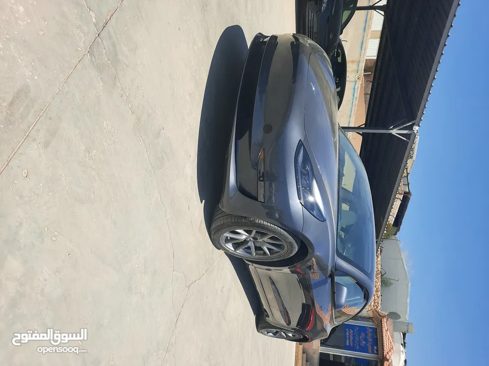 تيسلا موديل 3 موديل 2023 لون فيراني داخل ابيض عداد قليل بسعر مناسب