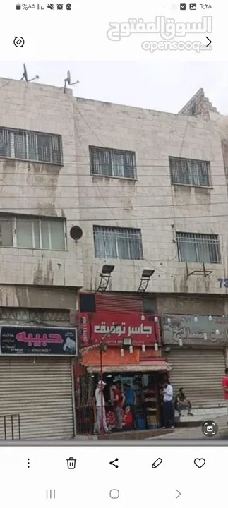 عمارتين ملتصقتين حي نزال شارع الدستور