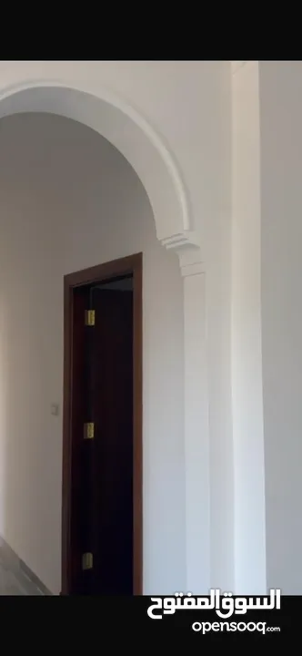 Excellent natural light and winds with views of Shafa Badran from the highest level in the building.