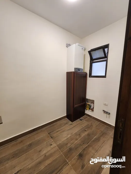 شقة طابقية للبيع في حي الصحابة - ref : 14579