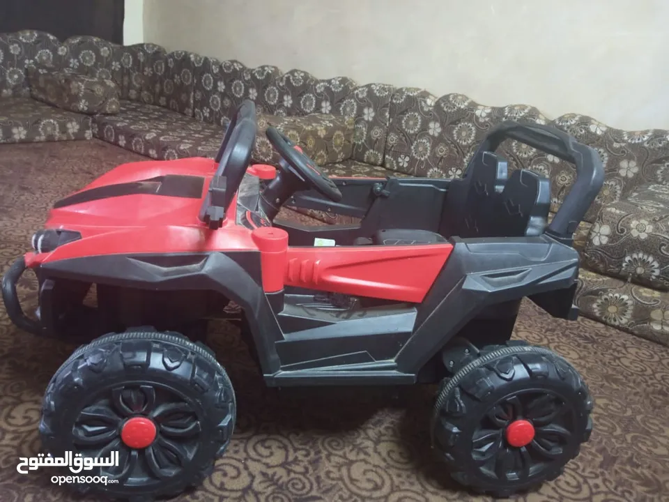 سياره كهرباء بطاريه 12 فولت فيها نظام هزاز للاطفال  تشبك بلوتوث اغاني  اضواء استعمال شهر اشي بسيط سع