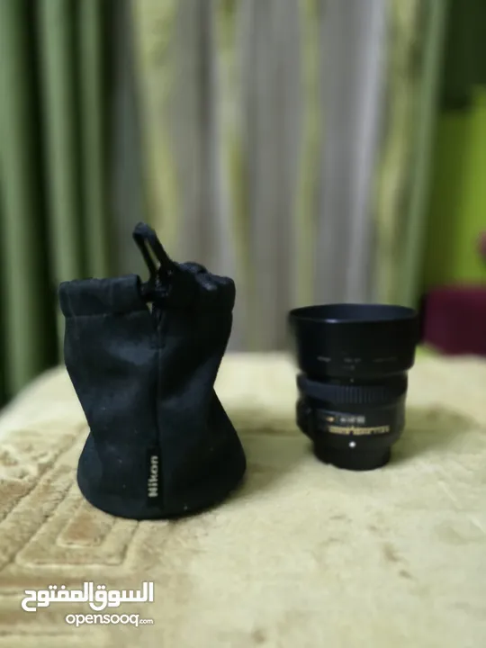 كاميرا نيكون NIKON D7100 مع عدسة 18-140 ملم للبيع  مع عدسة 50 ملم  للبيع بشكل منفصل "اقرأ بتمعن"