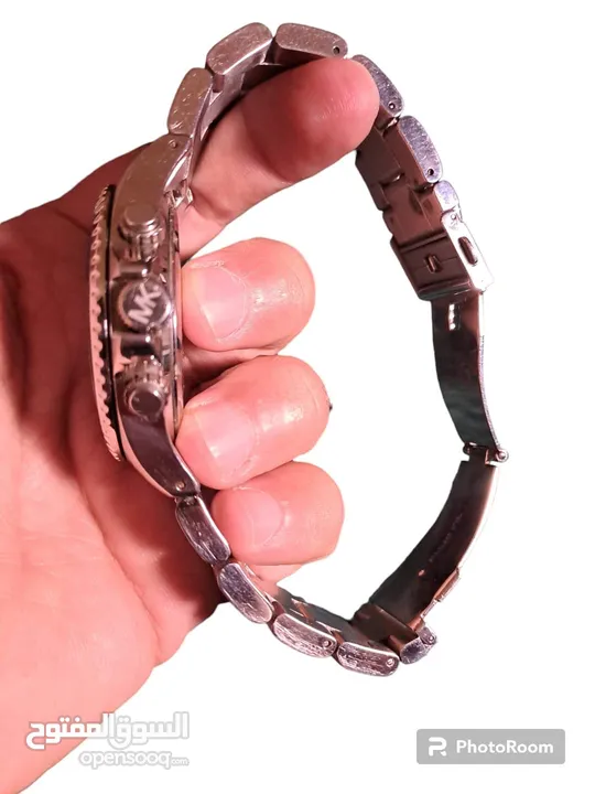 ساعه مايكل كورس