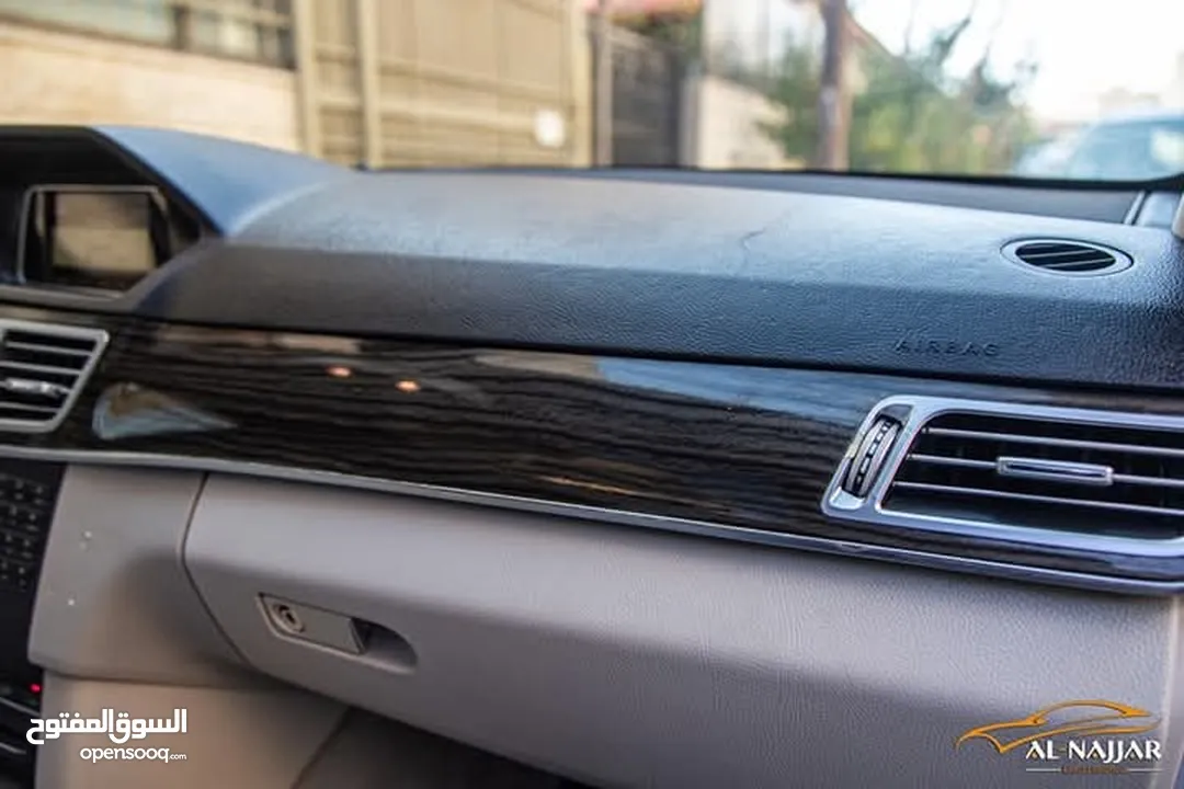 Mercedes E200 Avantgarde Amg kit 2015  السيارة وارد و بحالة الوكالة