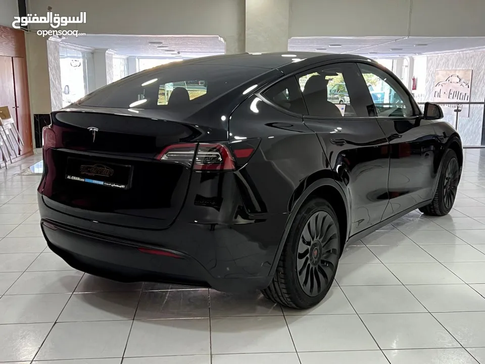 Tesla Model Y 2023  قاطعة : 12000 km فقط