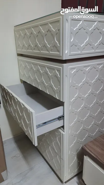 CHEST OF DRAWERS,USED IN THE LIVING ROOM