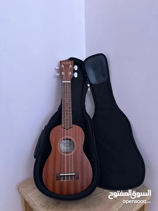 ukulele kala ka-15s يوكيليلي اصلي جديد مع الشنتة نوعية ممتازة جدا اوتار اصلية جديدة نوعية نضيفة