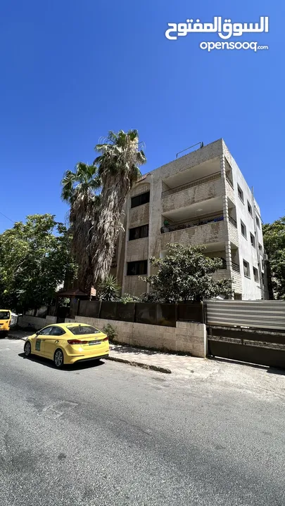 عمارة استثمارية وسكنية للبيع في الهاشمي الشمالي