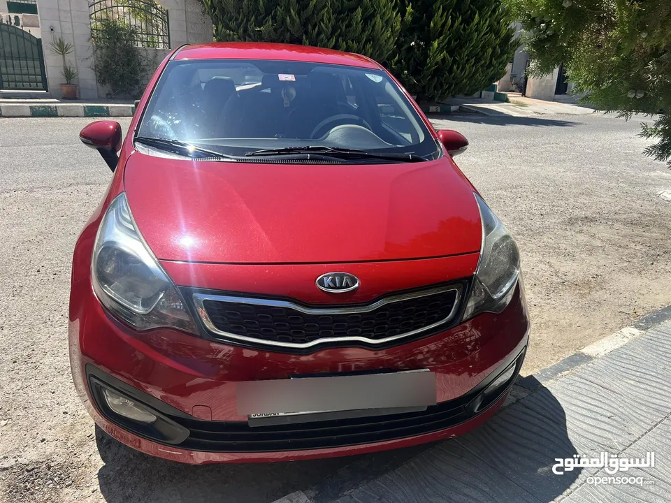 ماشيه 95000 فقطKia rio فل كامل عدا الفتحه