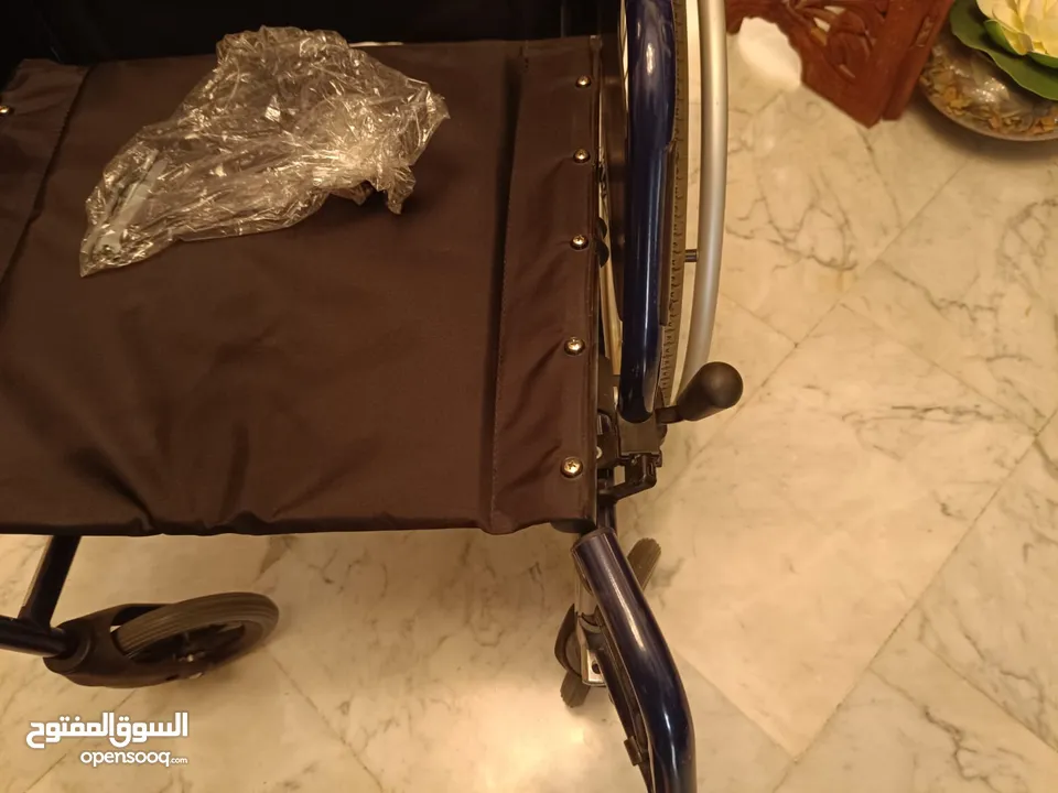 كرسي متحرك بعجال ڤيرميرين