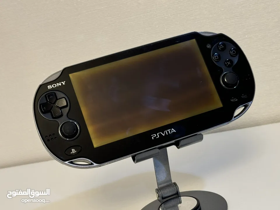 Psvita 1000 oled للبيع جهاز modded 64gb