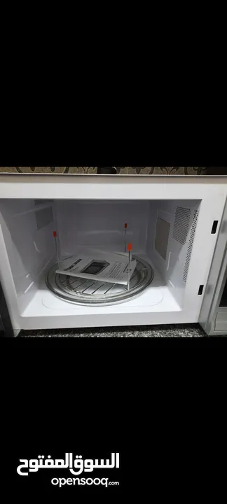 black and Decker microwave oven with grill  بلاك اند ديكر ميكرويف وشواية 30 لتر