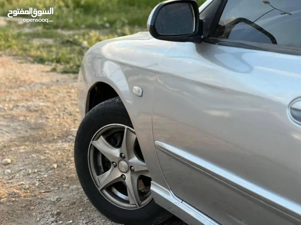 للبيع  كيا سبكترا 2002 - نظافة مميزة وسعر ممتاز سيارة اقتصادية ومريحة