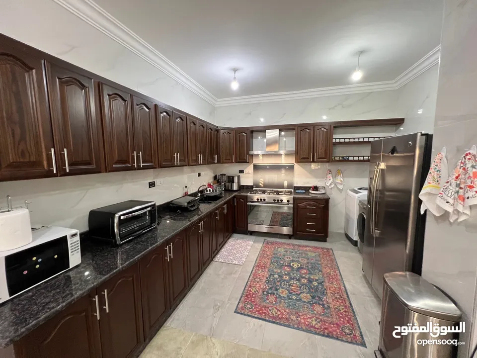 2 APARTMENTS 175M EACH WITH 450 M OUTSIDE IN DABOUQ.