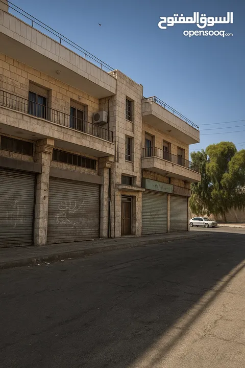 فرصة إستثمارية عمارة تجاري طابقين للبيع - جبل الحسين بالقرب من موقع جبل القلعة الأثري