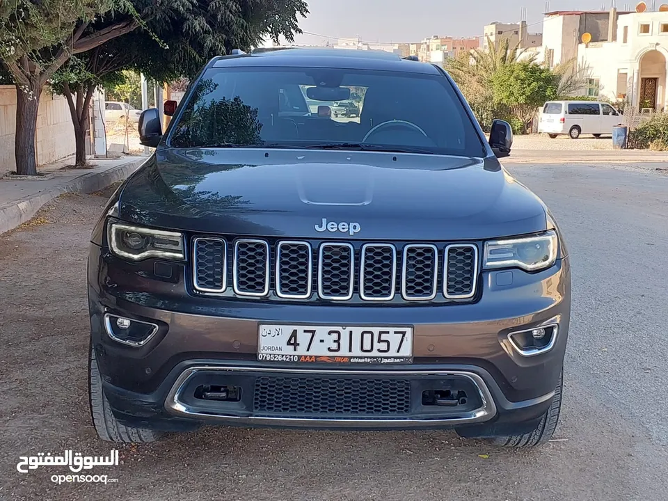 جيب جراند شيروكي فل الفل اعلى فئة بانوراما 2014 فحص كامل لون فيراني مميز بسعر مغري قابل للبدل والاقص