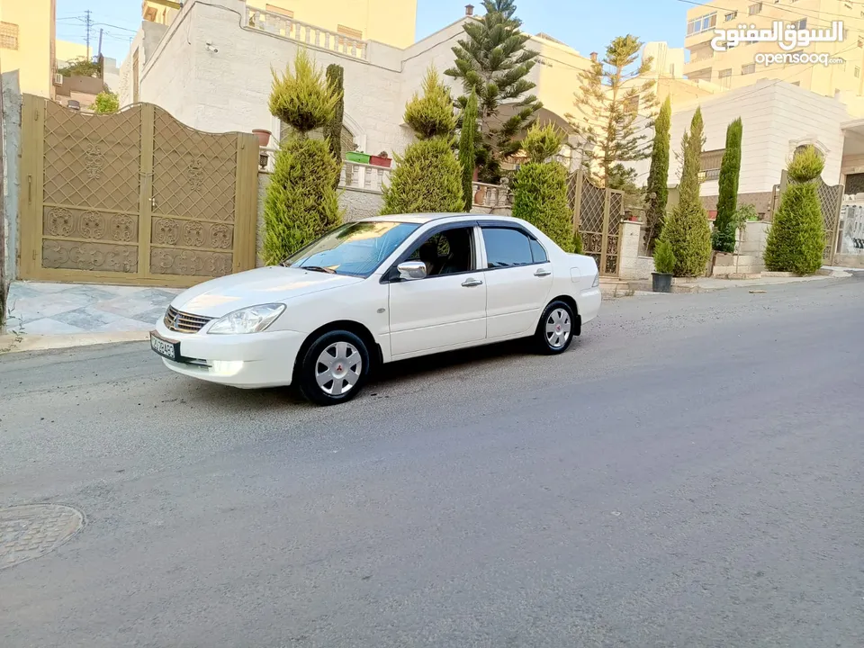ميتسوبيشي لانسر GLX موديل 2012 فحص كامل اتوماتيك خصوصي الأصل وارد الخليج