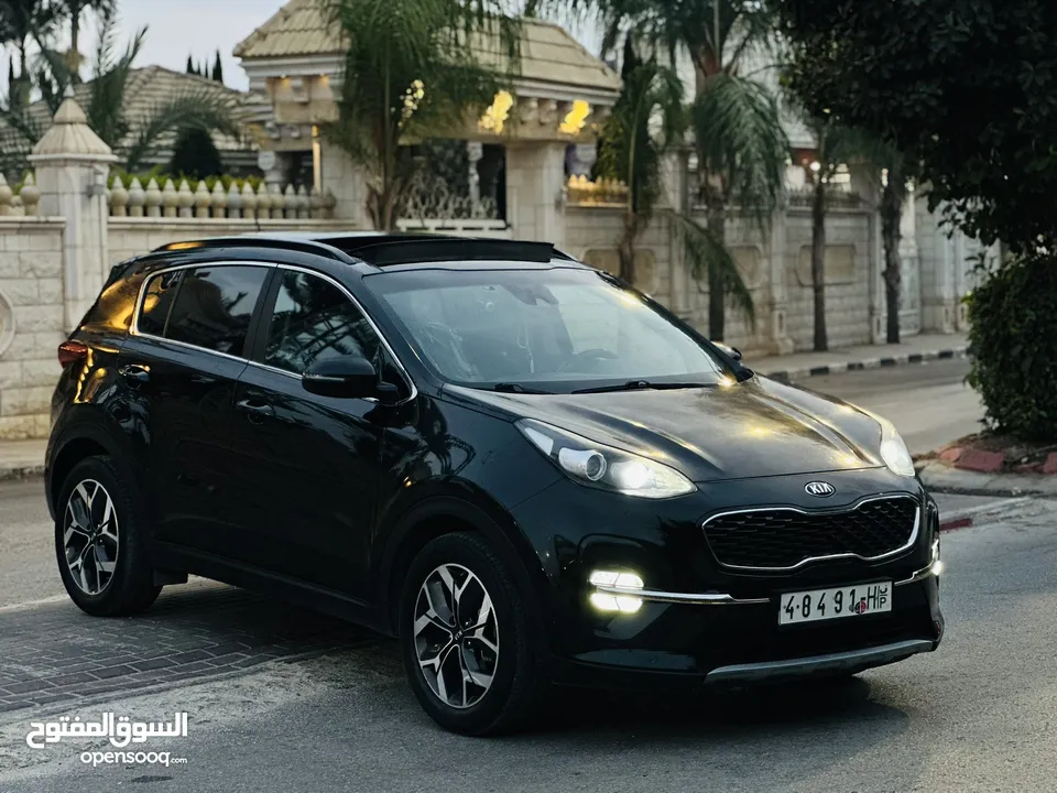 كيااا سبورتاج مطور 2000 بنزين 2*4 الجيب بالكراتين فل اضافات ملغم امكانية البيع نص بالنص الله يبارك