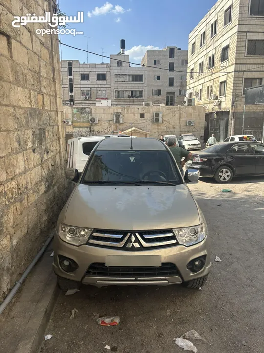 تندر متسبيشي L200 دفع خلفي 4x2 الحالة نظيف و السعر قابل لتفاوض مطور قير نظاف نظاف