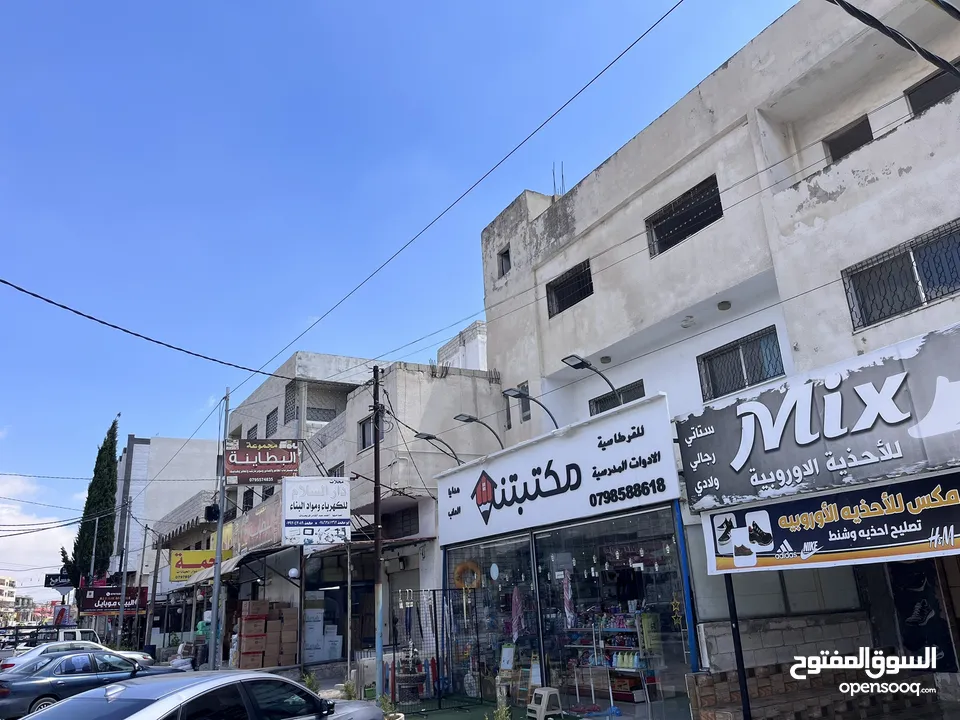 عقار للبيع على ثلث شوار ،تجاري ،اربع مخازن عالشارع الرئيسي  وطابقين سكن او مكاتب ،مساحة البناء 250م