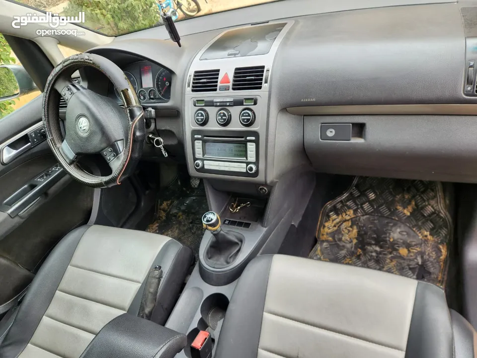 توران مدويل 2009 Volkswagen عائلية