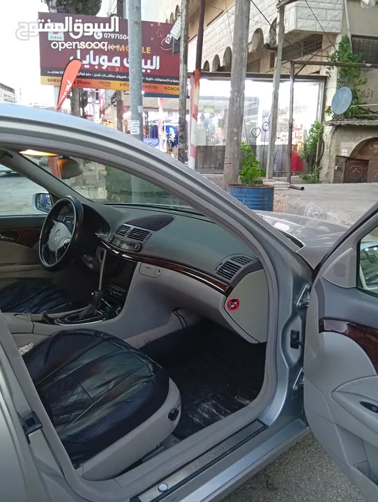 مرسيدس للبدل على احدث e200 كرت ابيض 2004