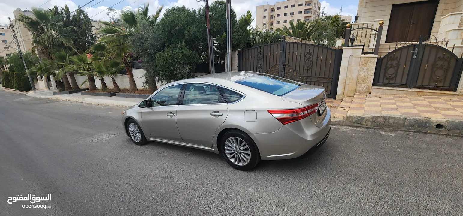 تويوتا افالون هايبرد 2015 فل كامل وأعلى صنف Limited وارد و مواصفات أمريكيه مالك واحد فحص كامل