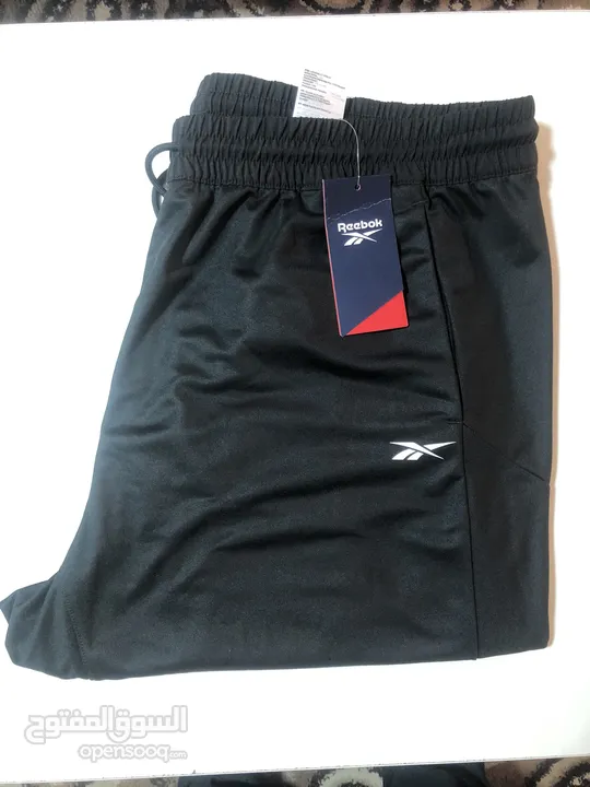 بنطلون reebok اسود مقاس xxl اصلي بورقته
