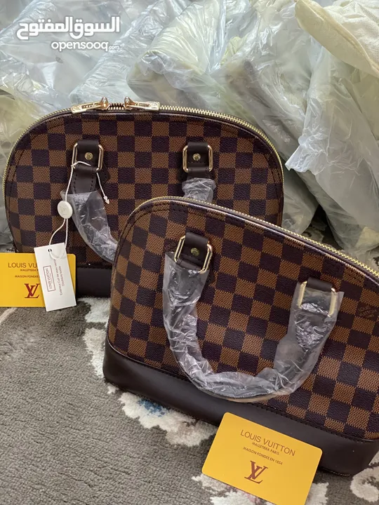 شنط يد LV / Prada