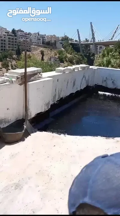 ابو علي لعزل الاسطح بالزفتة الساخنة والرولات وصيانة الشوارع وخلط اسفلت