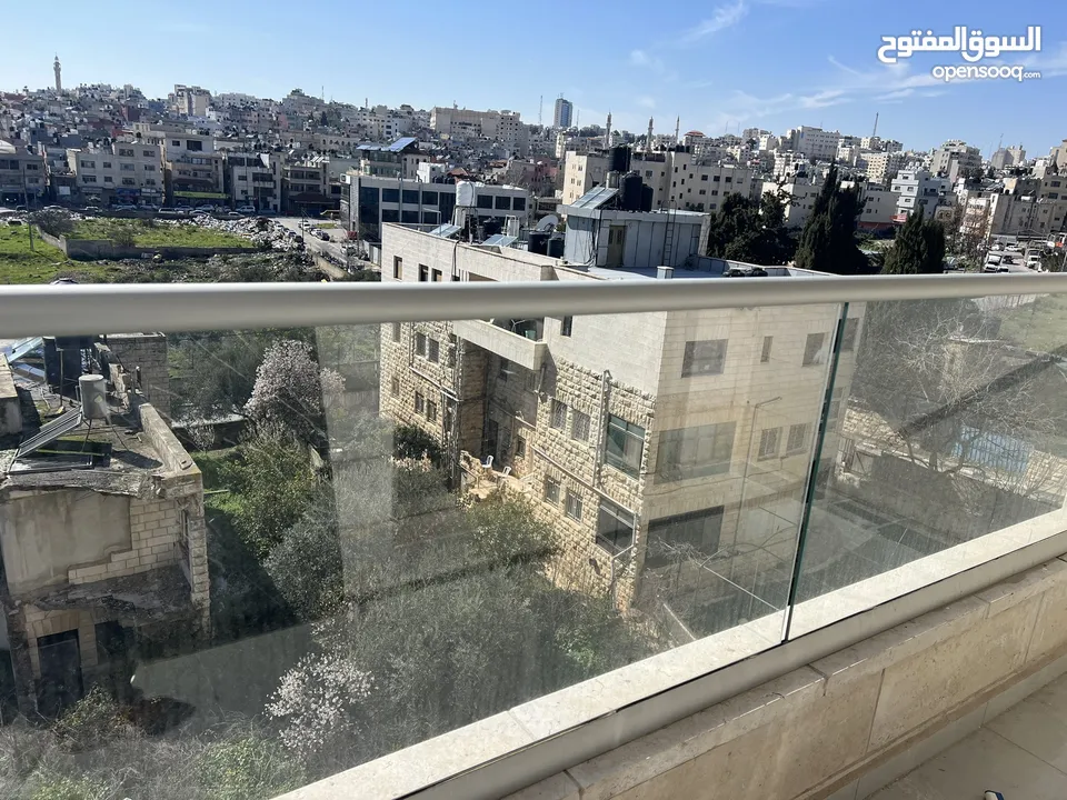 شقه للبيع في سطح مرحبا قرب ترست للتأمين
