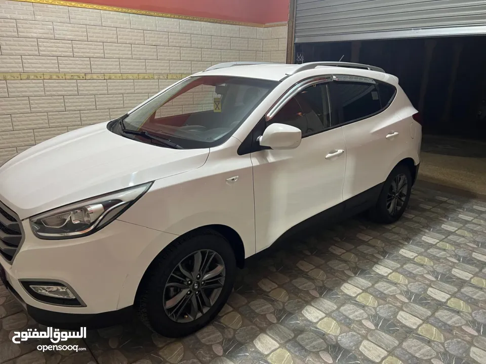 جيب توسان 2014 بوية شركة ولا غرام دهان حبة مميزة بكل تفاصيلها ايد 1 عداد حقيقي ب النايلون فعلي