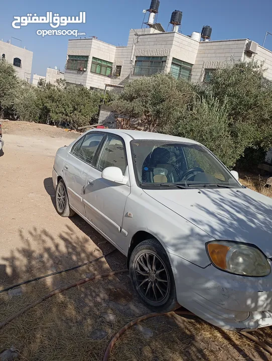 سيارة هونداي فيرنا 2003ميكانيكيات جيدة جدا وعيوب بسيطة بالبودي