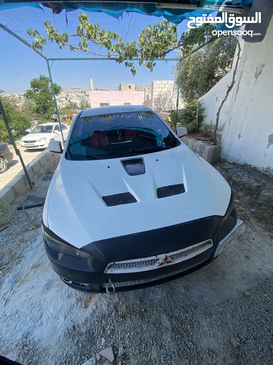 ميتسوبيشي لانسر فراشة 2014