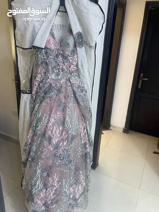 Brand new engagement dress from prestige . With the tag on it . Original cost of it was 