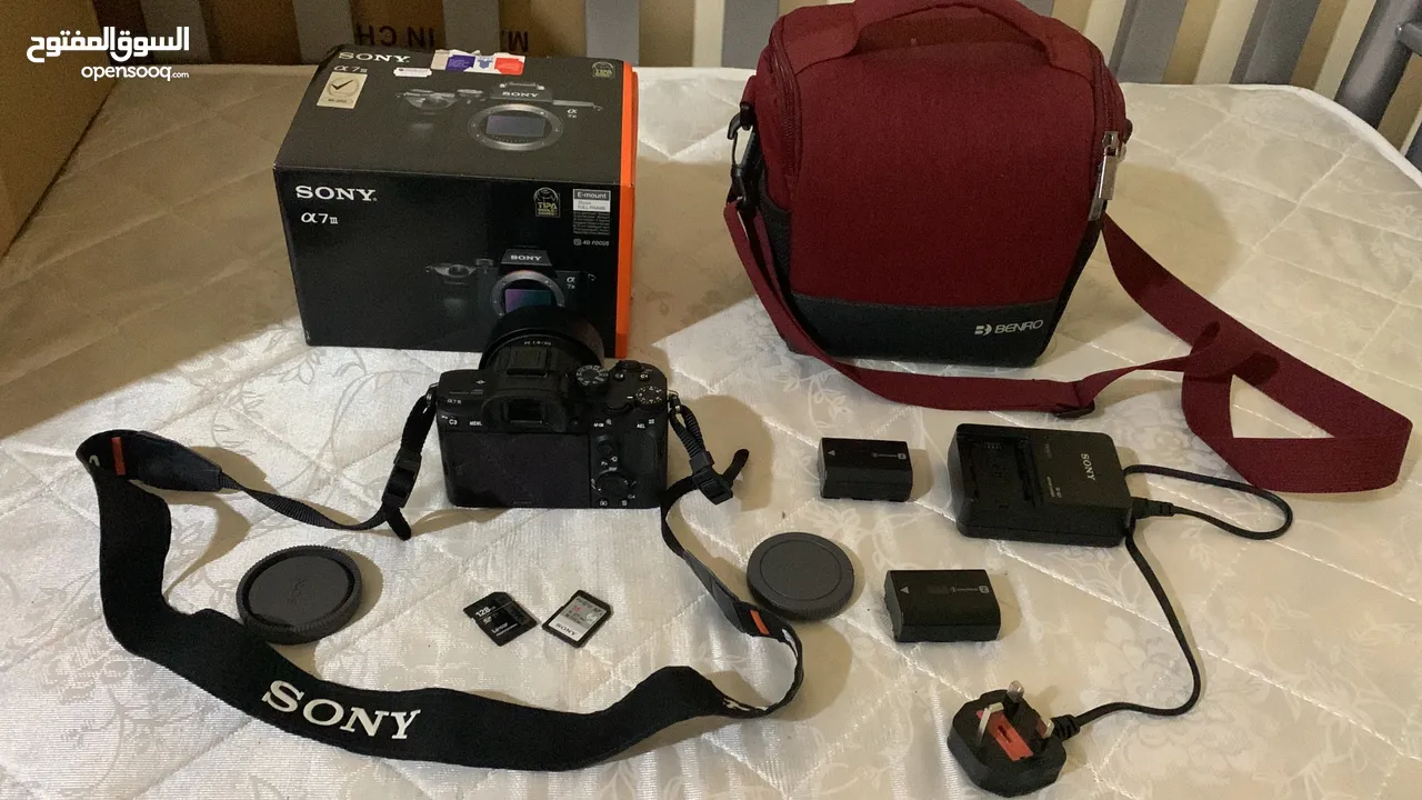 sony A73 camera body +50mm1.8 + charger + 2battery + 2 sd cards + red clr bag