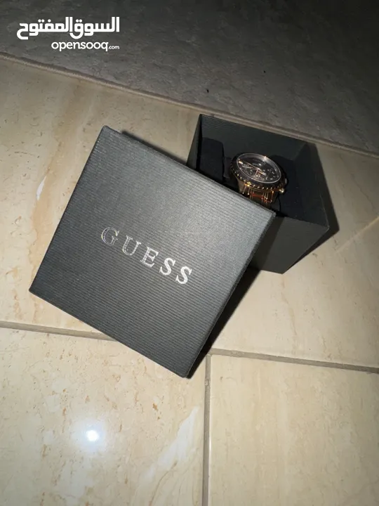 ساعه GUESS لون برونز