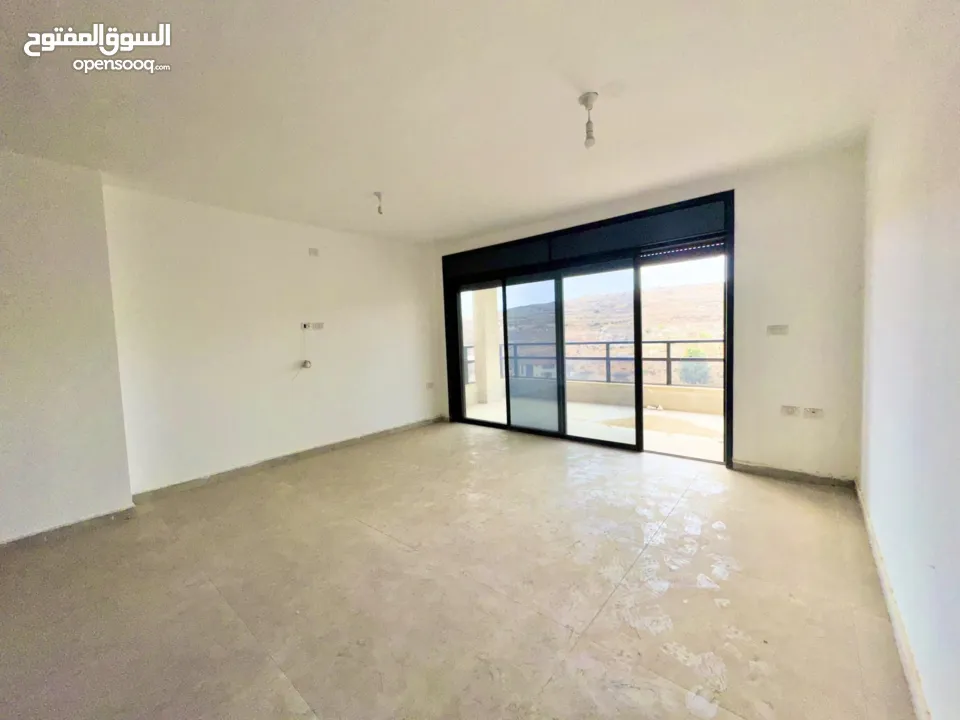 شقق للبيع في عين منجد