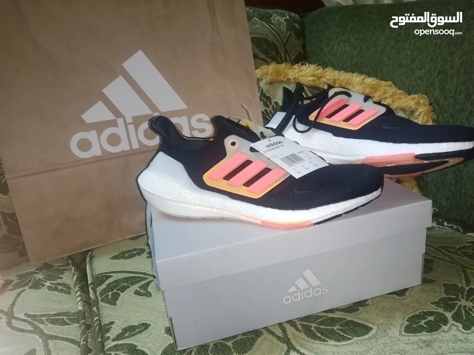 حذاء adidas UltraBoost 22 Black Flash Orange اصلي بنص سعره بسعر مغري جدا الفضل للمشي والراحة