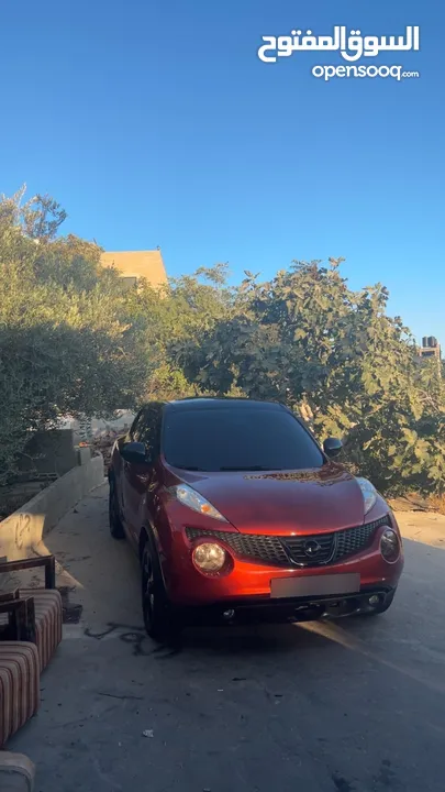 نيسان جوك 2012  محرك 1.6  توماتيك  جير مطور 100% ع الفحص  خالية من الضربات مغير لون على نضاف  يد2