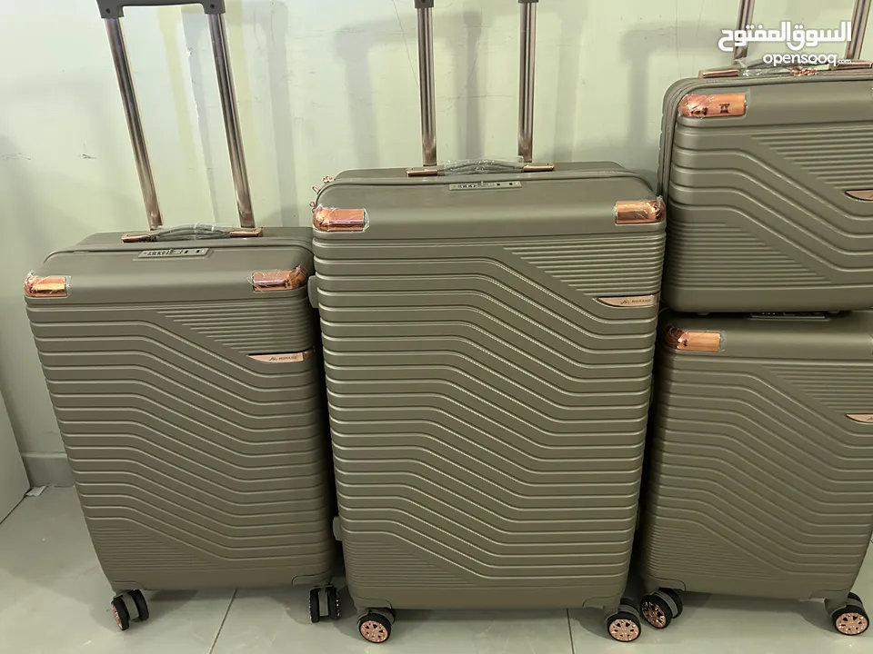 4 piece Travel bags Morano Rose gold bags - Medinah only