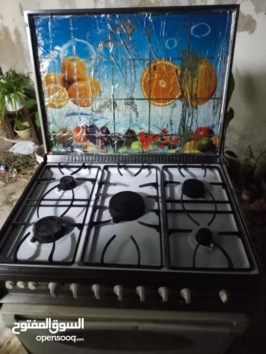 بوتغاز يونيرفسال ابيض شغاله فوق تحت وبسعر حرق.....