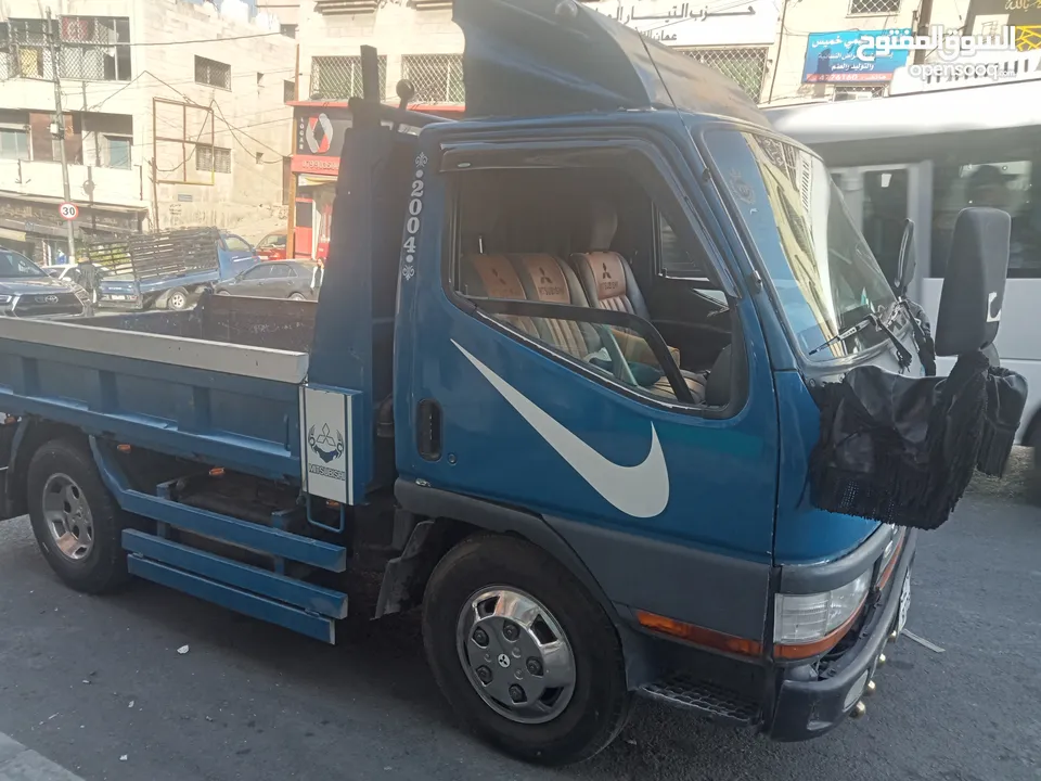 قلاب متسوبيشي كانتر مترين اصلي للبدل على قلاب عريض 2007