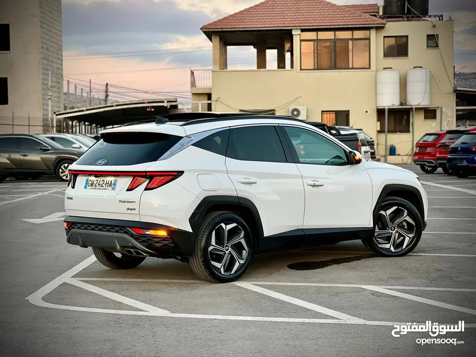 هونداي توسان/2022 Plug In فل الفل فتحة سقف بانوراما  4x4 ///271Hp   ( Haybrid) 1600cc