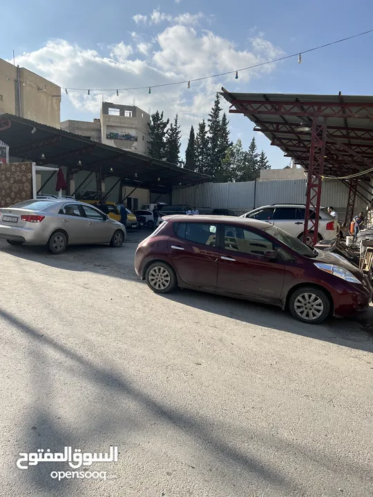 محطة غسيل سيارات وبناشر للبيع في عين الباشا