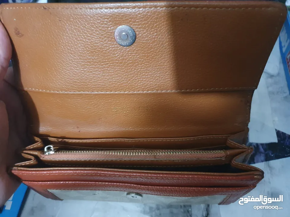 محفظة  COACH NEW YORK