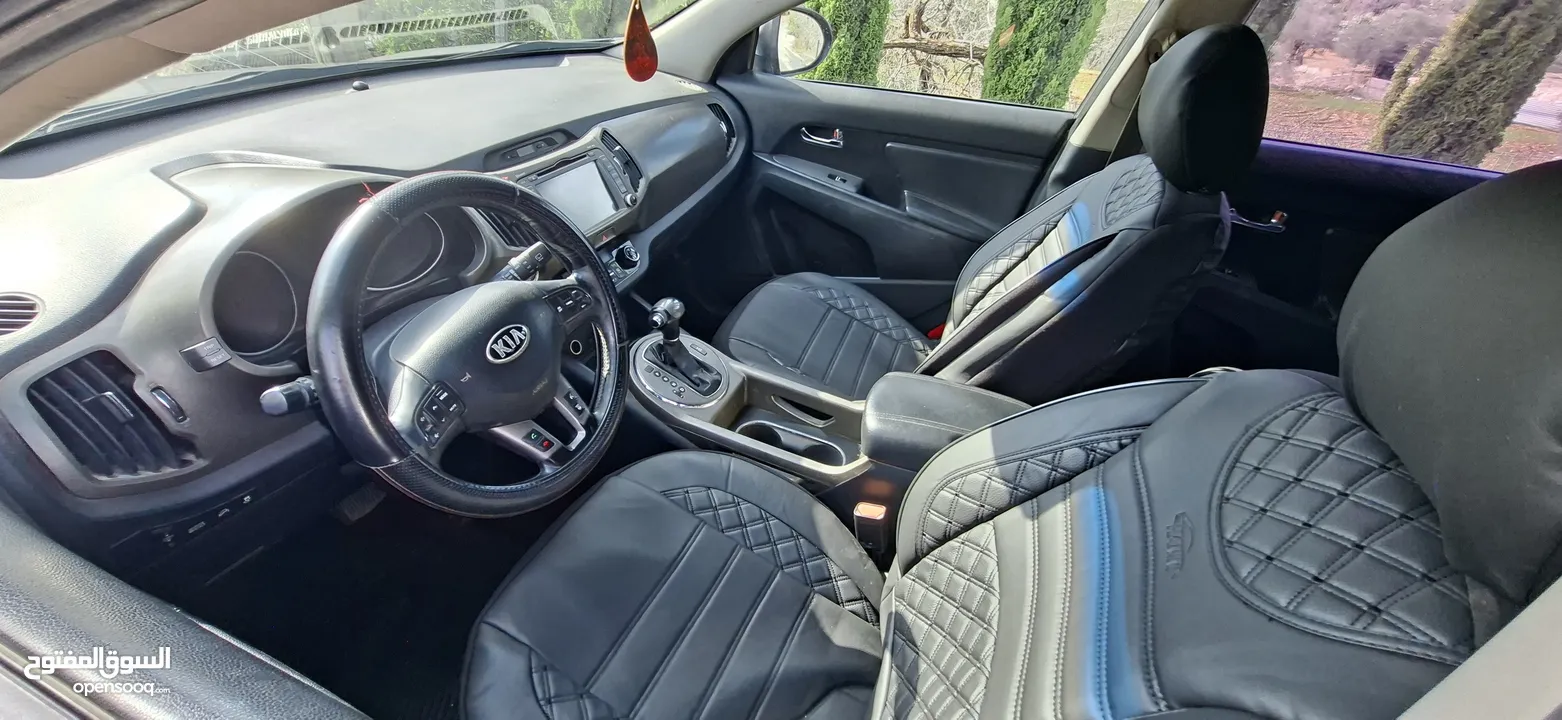 جيب كاياسبورتاج موديل 2014-اتومتيك'دفع 4×4 ماتور 2000ديزل فل فل اضافات ماعد الفتحة - نظيف من الاخر