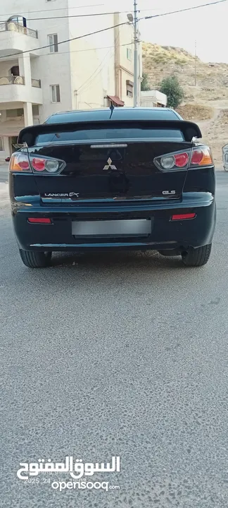 متسوبيشي لانسر فراشة موديل 2015 فحص مرفق مع الصور بحالة الوكاااااالة  ماشية 49 الف km  أصلي