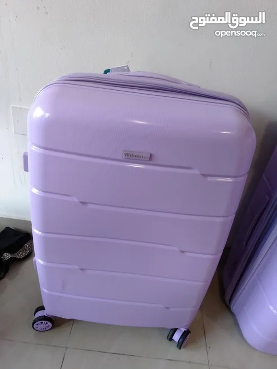 purple suitcase used once