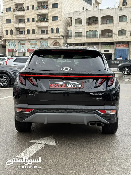 هونداي توسان ترخيص 2022 محرك 1600 هايبرد plug in/يقطع على الشحنه 65 كيلو متر جير أوتوماتيك
